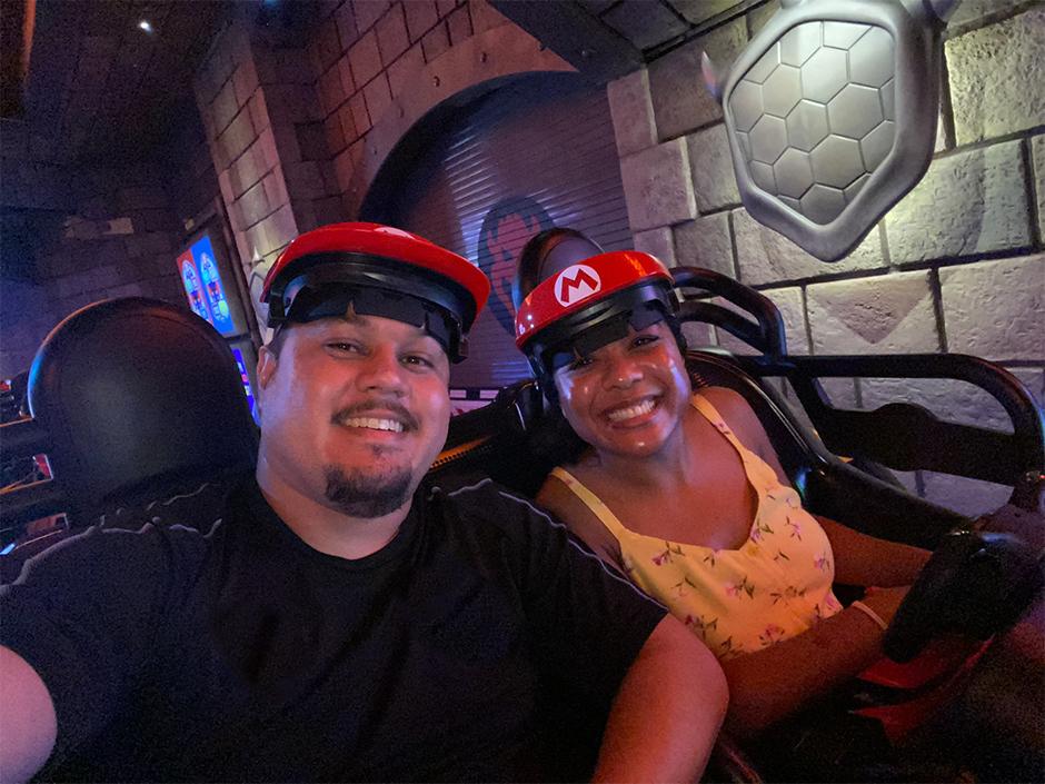 A family selfie on the Mario Kart ride.