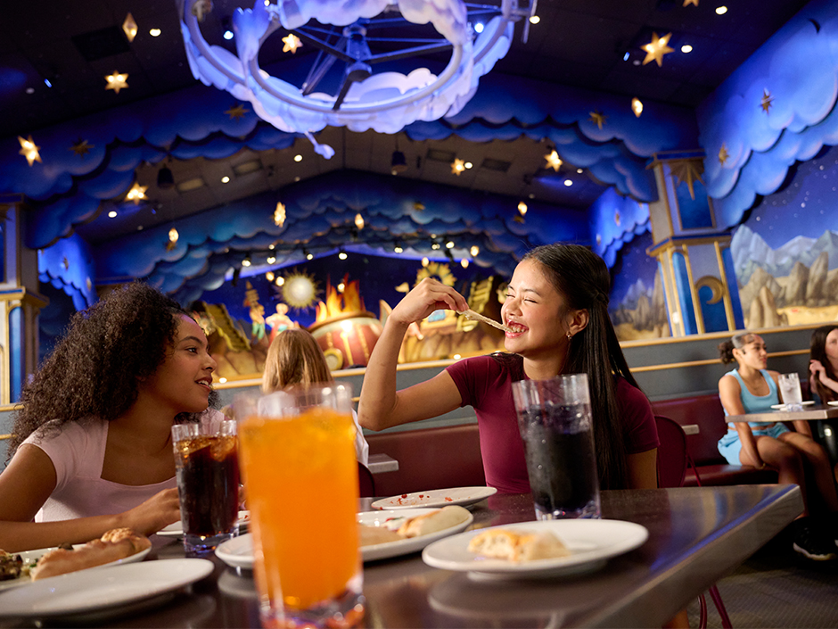 Teens enjoy their meals at Pizza Moon.
