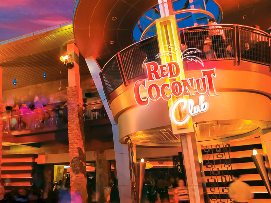 An exterior view of the Red Coconut Club at night.
