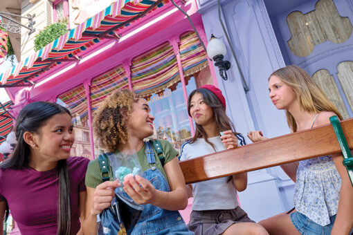 Teen girls in Ministry of Magic enjoying a sweet treat.