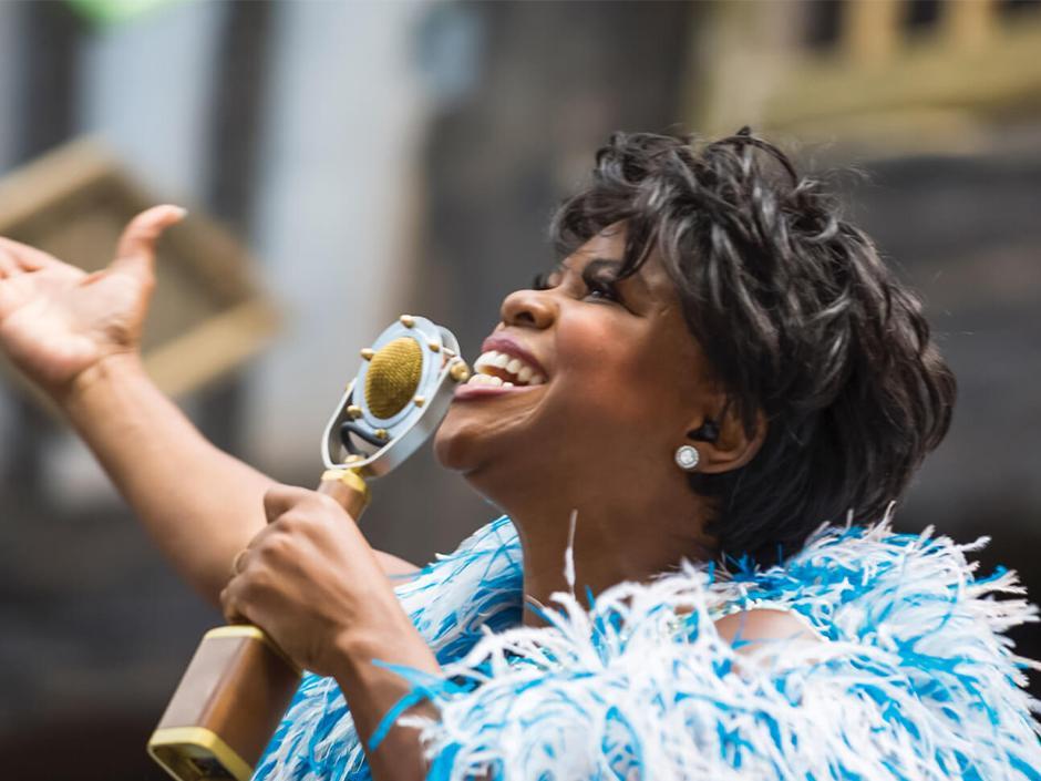 A close-up of Celestina Warbeck singing during her show in Diagon Alley at Universal Studios Florida