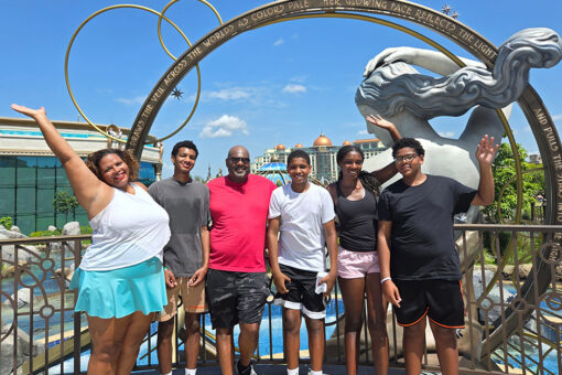 A photo of Maria and her family in front of Kronos
