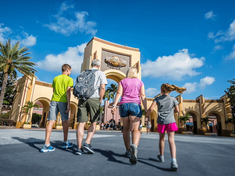 A family walks into Universal Orlando Resort.