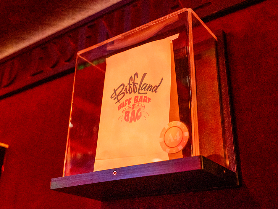 A barf bag from the fictional "BiffLand" theme park