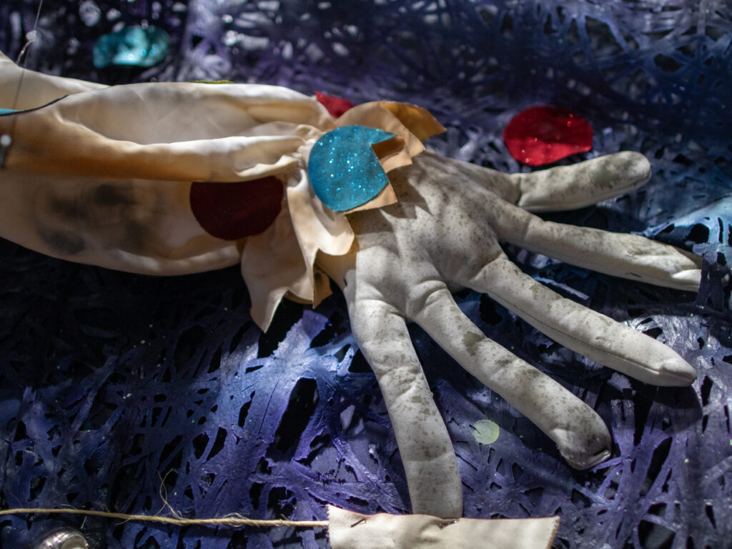 A clown arm in the Jack & Oddfellow: Chaos & Control house at Halloween Horror Nights 2026