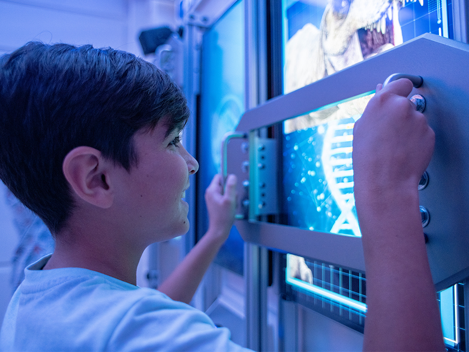 A boy in an escape room at Universal's Great Movie Escape