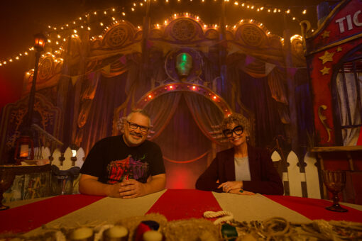 Charles Gray and Lora Sauls smile at the camera during their conversation about HHN on the HHN Podcast