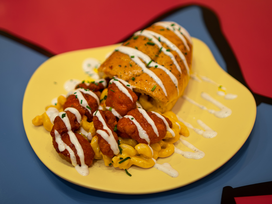 Plate of Morris's Mac-nificent Mac and Cheese Cone at Circus McGurkus Cafe Stoo-pendous in Universal Islands of Adventure.