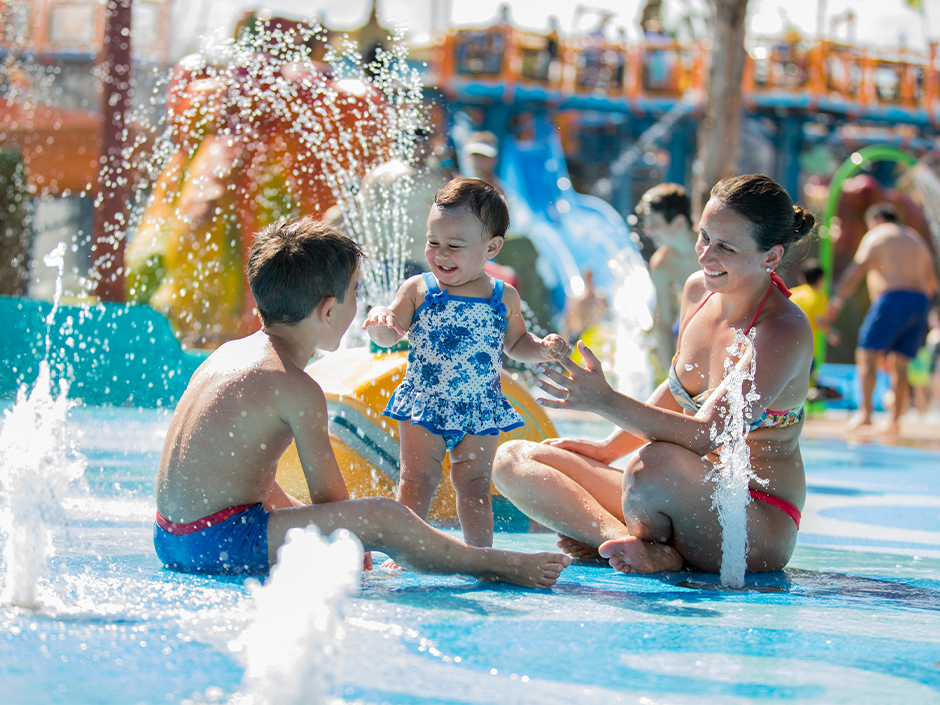 A family plays together at Runamukka Reef - River Village  