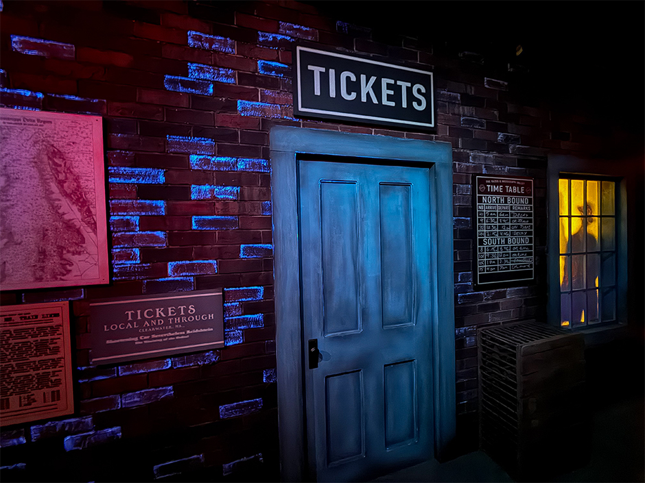 Exterior of the train station in the Sinners haunted house at HHN at Universal Orlando Resort.