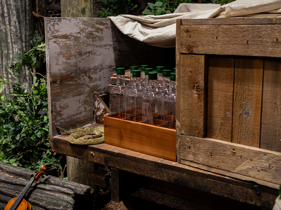 Glass bottle props from the Sinners haunted house at HHN at Universal Orlando Resort.