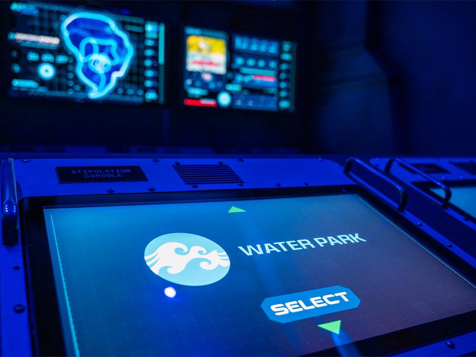 A screen showing the words "Water Park" inside Jurassic World: Escape