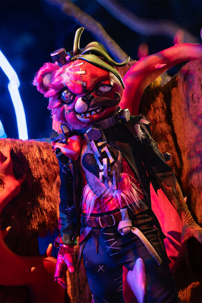 The FORTNITEMARES Bear poses for a photo in the scare zone.