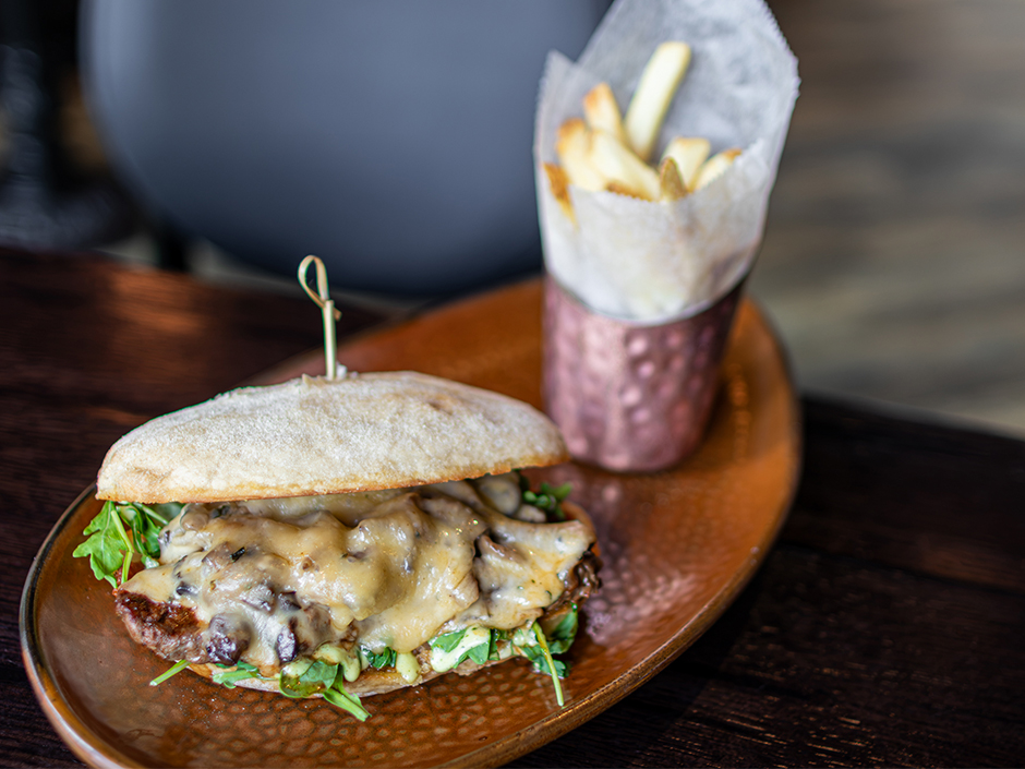Plate of a Grilled Steak Sandwich and a side of fries for the Toothsome 10 Year Anniversary.