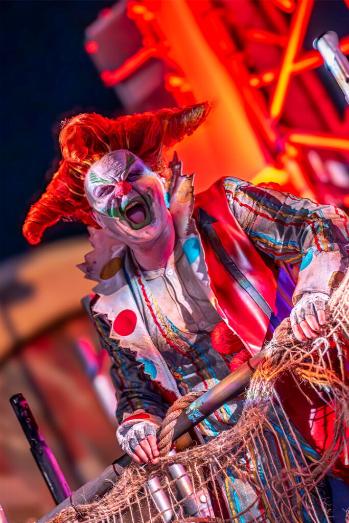 Jack snarls menacingly at the camera from his podium in the Infernal Carnival of Nightmares at HHN