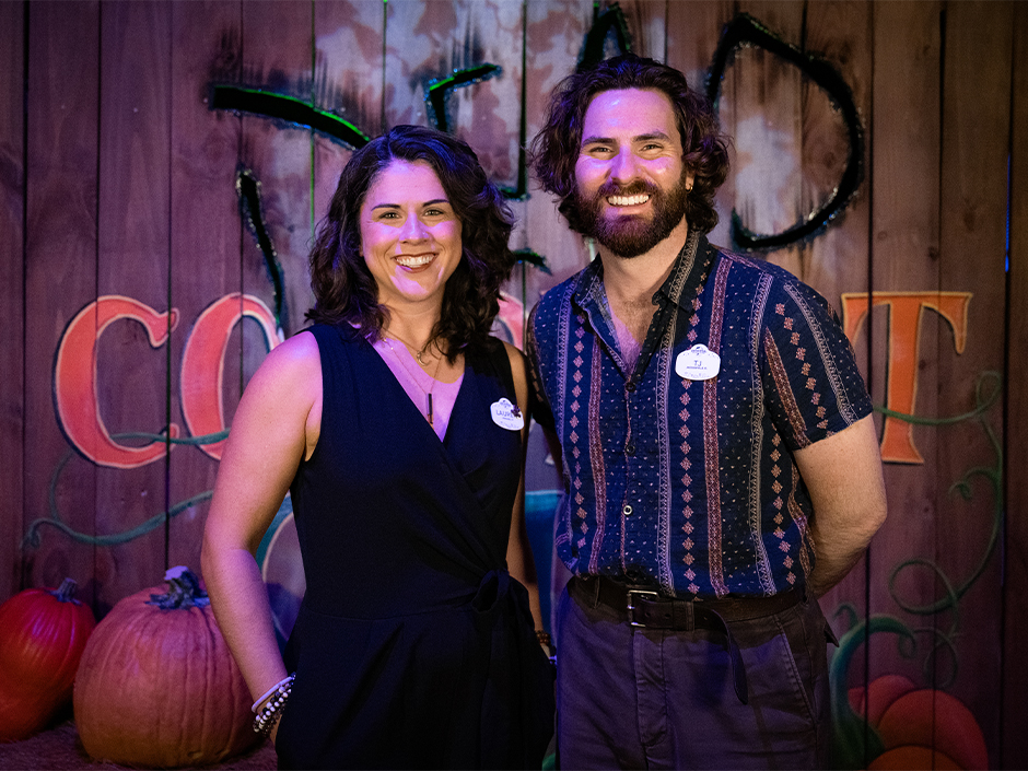 Lauren and TJ pose together inside Dead Coconut Club