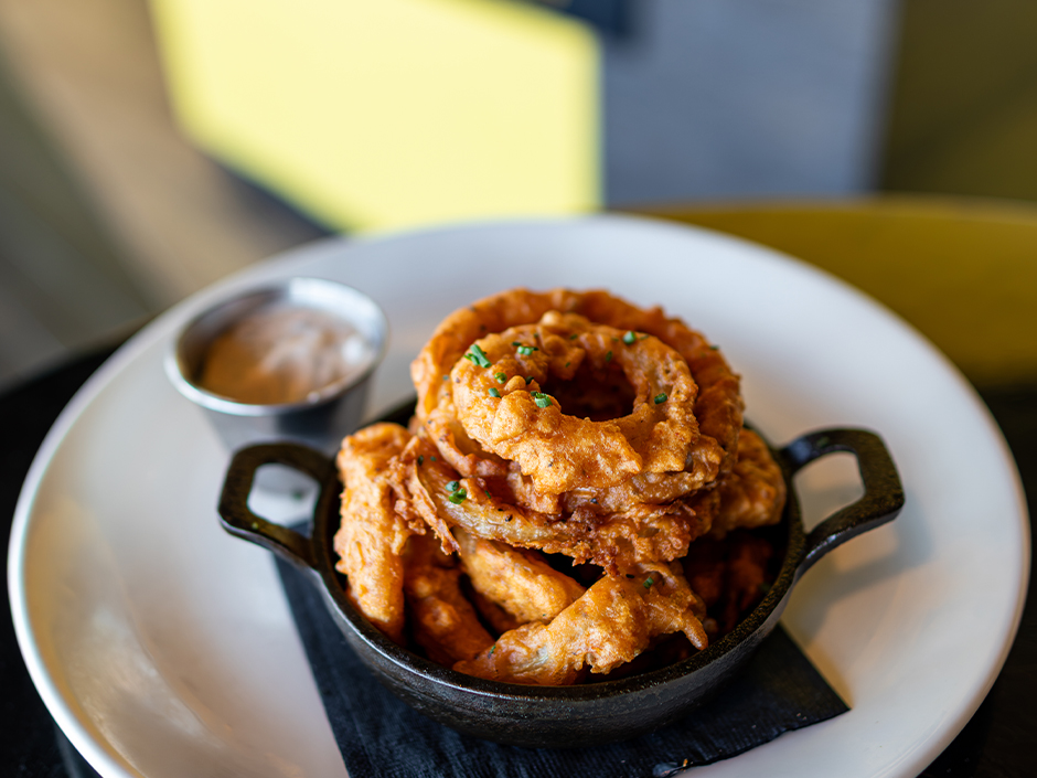 Plate of the Onion Hoop appetizer at NBC Sports Grill & Brew for the NBA Tip-Off.