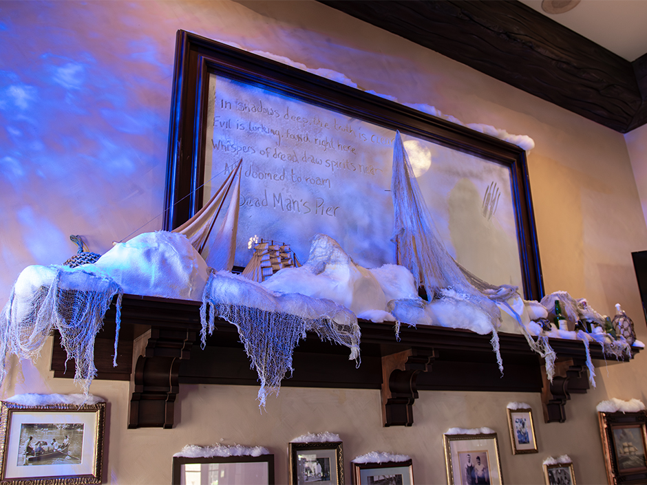 Mantel in Thirsty Fish covered in cobwebs