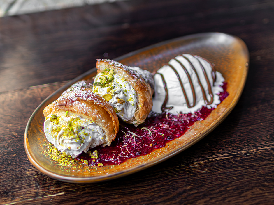 Plate of Pistachio Croissant and ice cream for National Chocolate Day at Toothsome in Universal CityWalk.